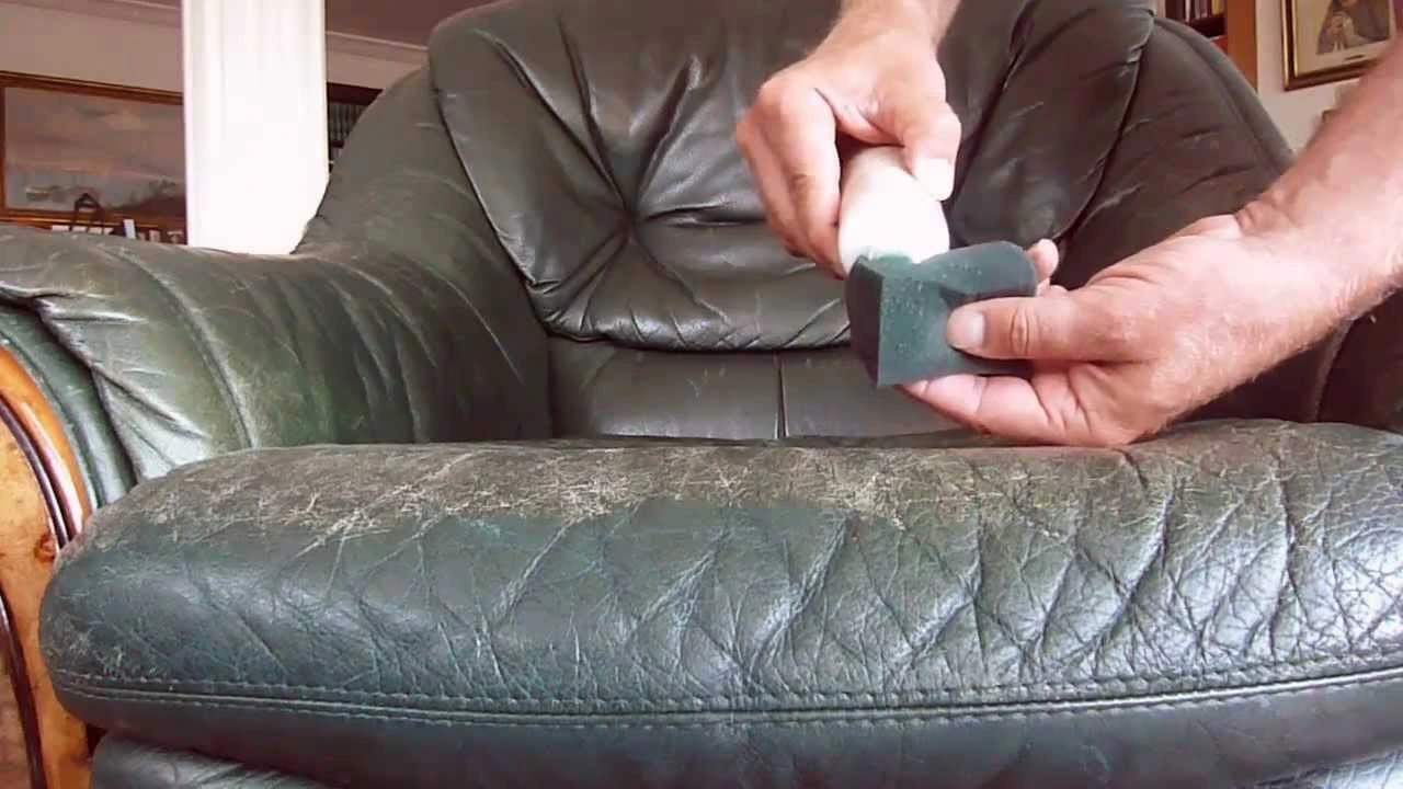 Upholstery repair in progress — cushion, fabric, and frame attention